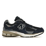 New Balance 2002R Protection Pack Navy Grey Auktion